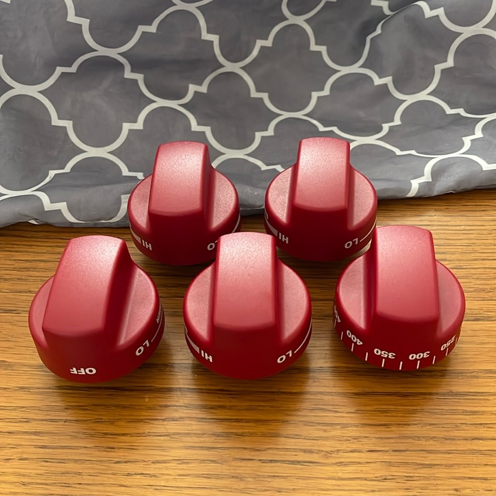 Brand new 5 pc set Wolf range knobs-Red